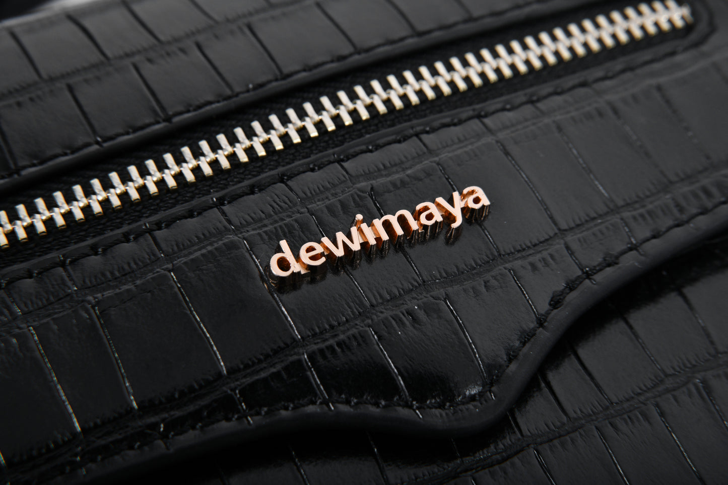 Dewi Maya Arliana Black Belt Crossbody Bag gold dewi maya logo made by Dewi Maya available at the best boutique in Upstate South Carolina Spartanburg Greenville Dewi Maya Boutique