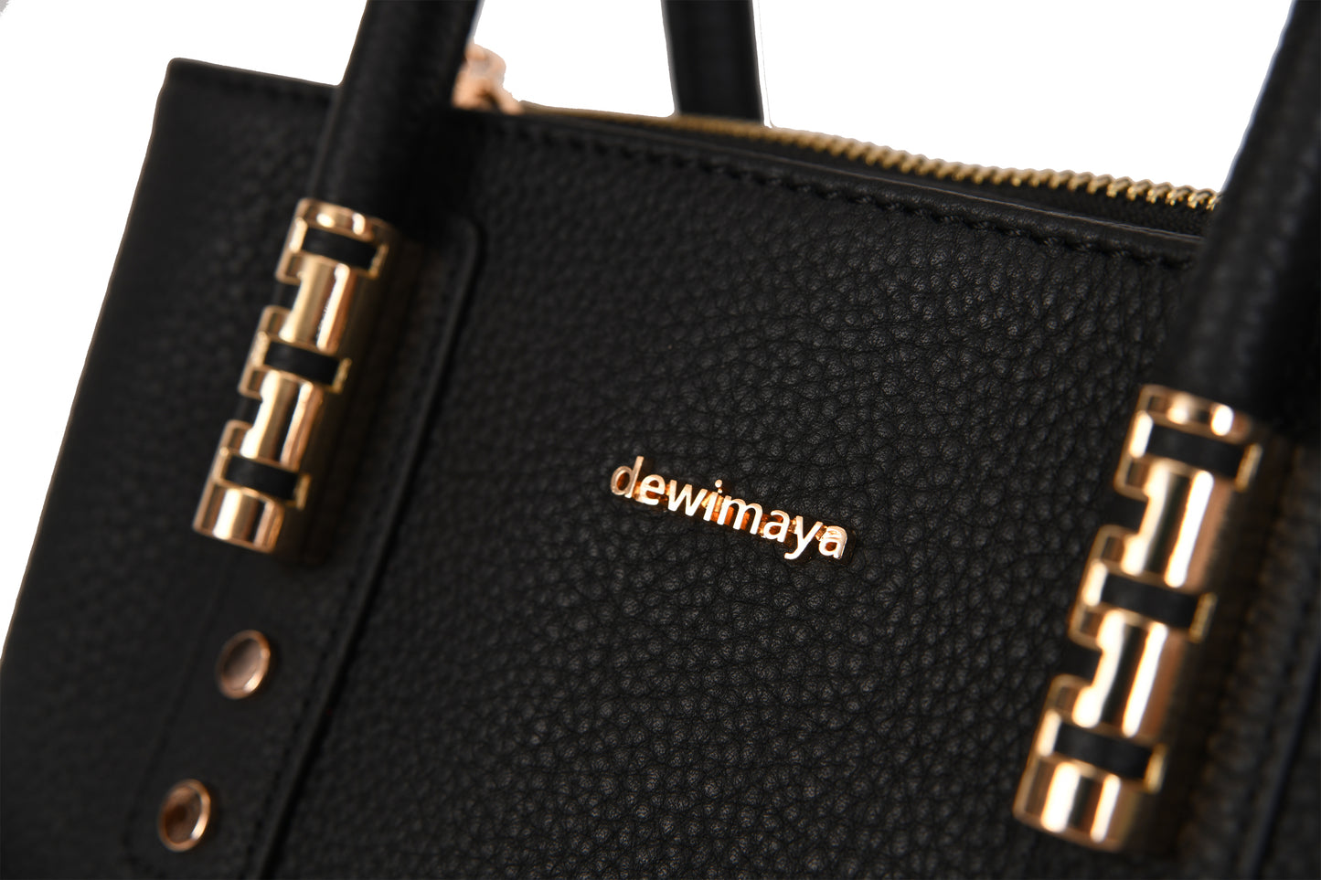 Ayana Black Pebble Grain Leather Small Handbag made by Dewi Maya gold logo available at the best boutique in Upstate South Carolina Spartanburg Greenville Dewi Maya Boutique