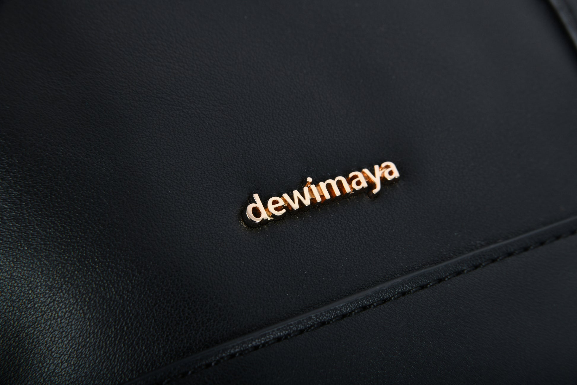 Darti Black Handbag made by Dewi Maya gold logo available at the best boutique in Upstate South Carolina Spartanburg Greenville Dewi Maya Boutique