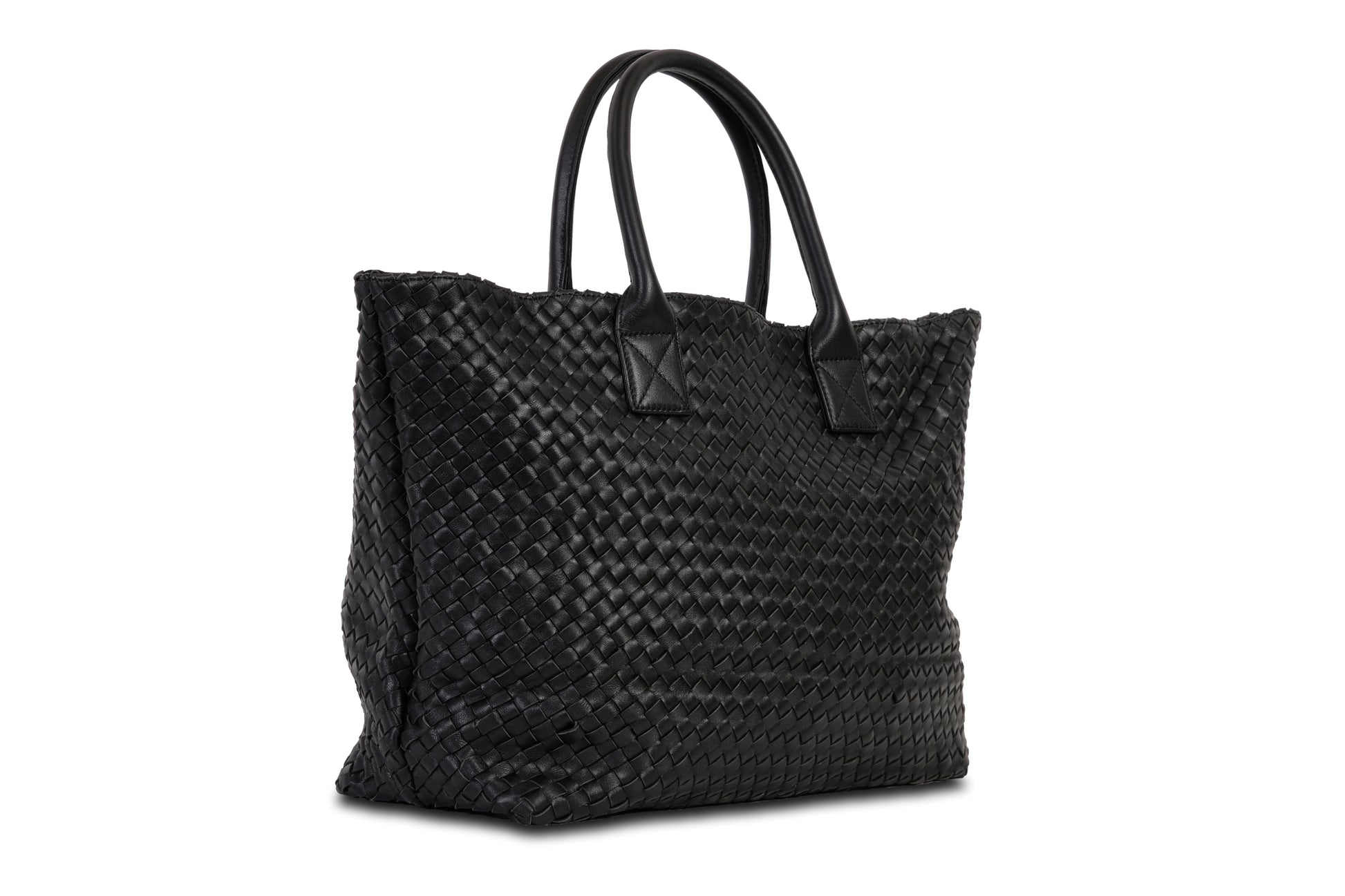 Destarina Midnight Black Crosshatch Leather Tote Bag Handbag made by Dewi Maya side view available at the best boutique in Upstate South Carolina Spartanburg Greenville Dewi Maya Boutique
