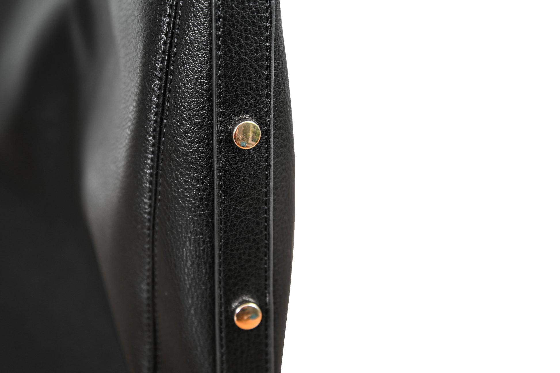 Luna Midnight Black Crescent Pebble Grain Faux Leather Handbag made by Dewi Maya detail photo of gold rivets available at the best boutique in Upstate South Carolina Spartanburg Greenville Dewi Maya Boutique